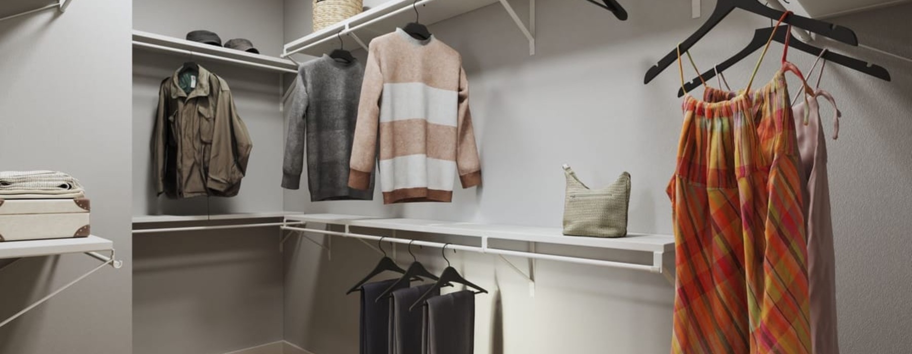 a closet with clothes hanging up